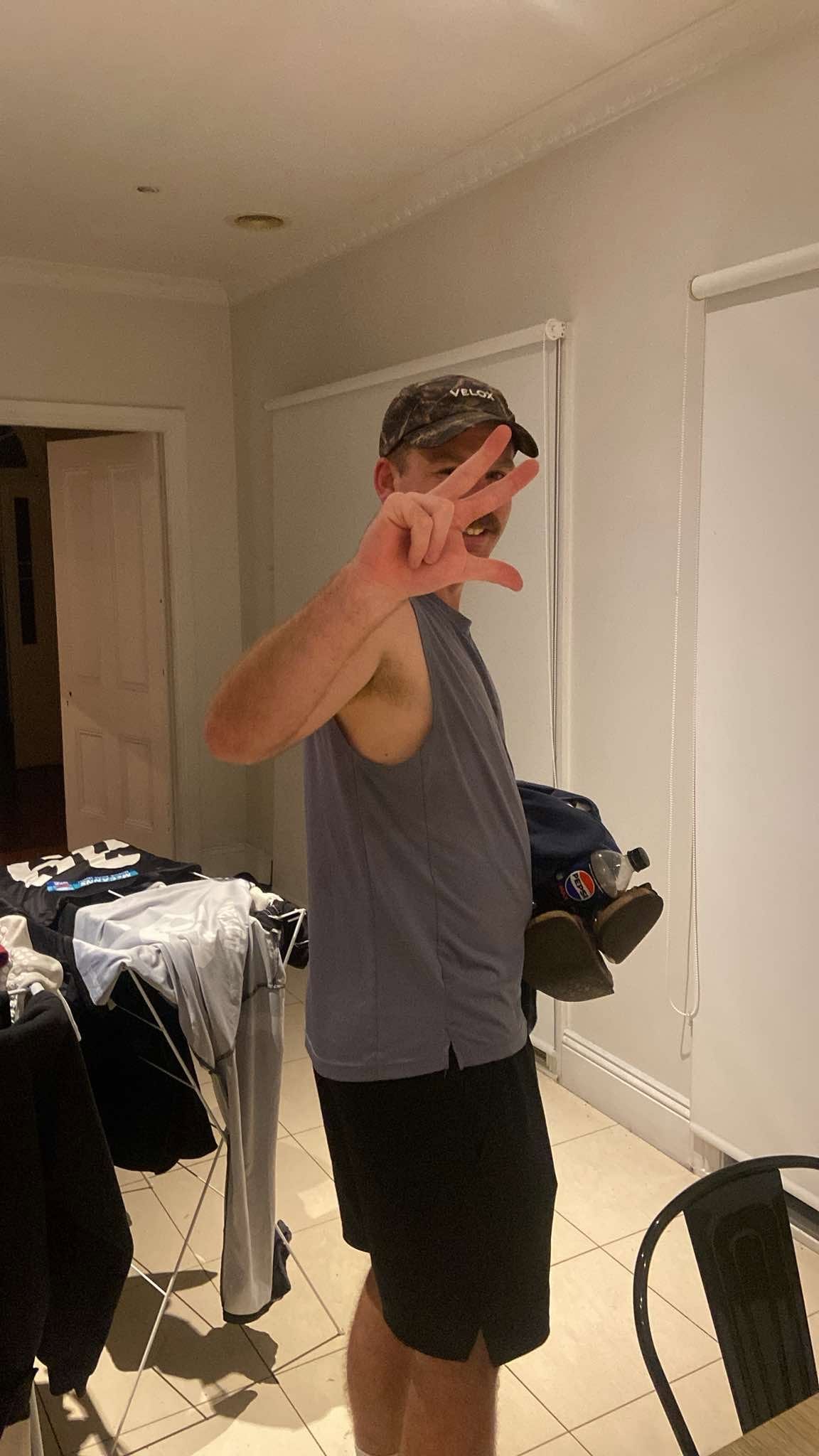 Fraser Wilson throwing up a three-pointer sign after the Fuzz game
